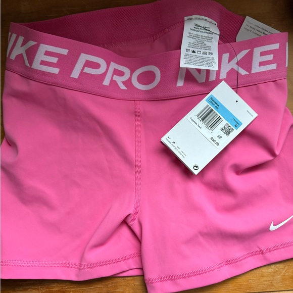 Nike Pants - NWT pink Nike Pro shorts - M